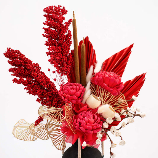 Handcrafted preserved flower arrangement in romantic hues